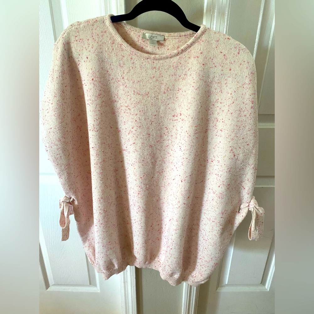 Nearly new sweater poncho with side toes for armholes.100% cotton. Machine wash.